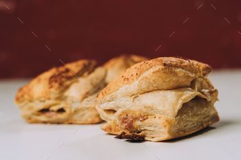 Closeup of Pain au chocolat pastry on a white surface