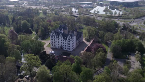 Medium aerial view of Wolfsburg Castle in Germany