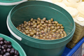 Buckets of olives for sale street food market - PhotoDune Item for Sale