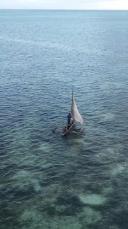 Vertical Video Boats in the Ocean Near the Coast of Zanzibar Tanzania