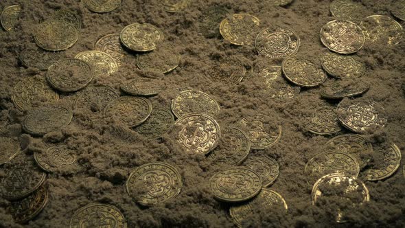 Treasure Gold Coins Mixed In The Sand After Shipwreck