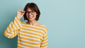Smiling woman in glasses with copy space - PhotoDune Item for Sale