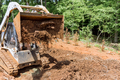 Planning work site on improvement of tractor prepares courtyard territory - PhotoDune Item for Sale