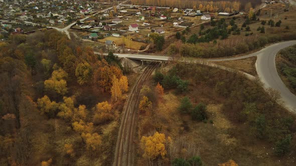 Aerial View of Bridge Over Railway in Countryside