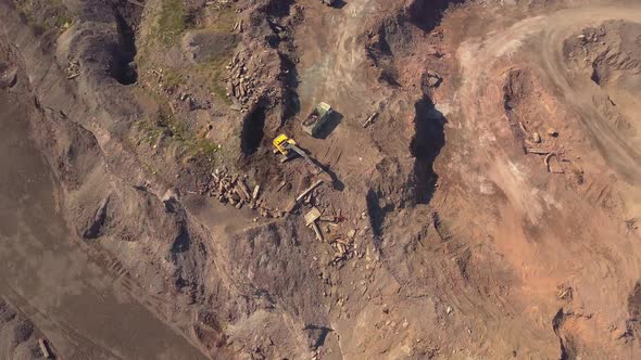 Aerial View of Working Excavator in the Opencast Mine