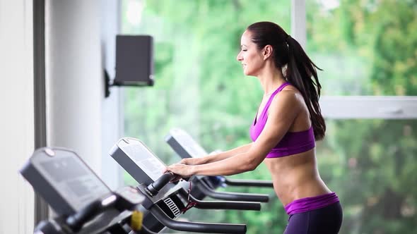 Woman Running on Treadmill