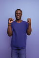 pleasant young american male adult rejoices in victory - PhotoDune Item for Sale