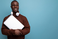 young american sound producer with laptop and headphones on background with copy space - PhotoDune Item for Sale