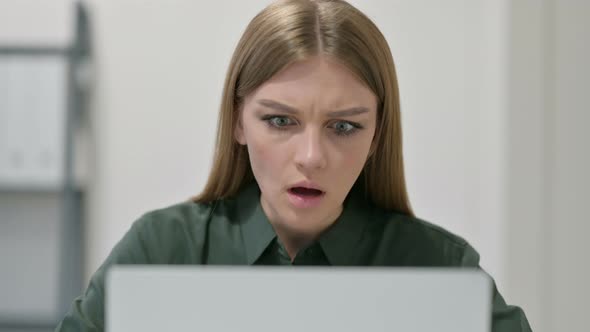 Portrait of Woman Having Loss While Using Laptop 