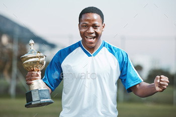 Sports, soccer player and man celebrate trophy for competition or game outdoor. Portrait of black m