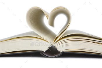 Open book with heart shaped pages. Love for reading