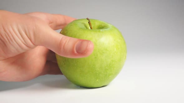 Man Hand Take Green Apple