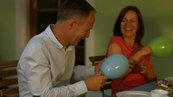 Parents Having Fun at Birthday Party