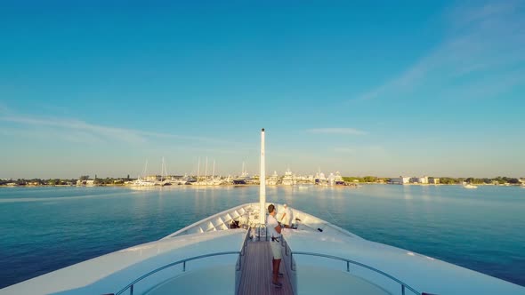 Time Lapse of big yacht cruising through Port