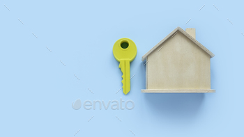  beside a house model. Blue background with copy space.