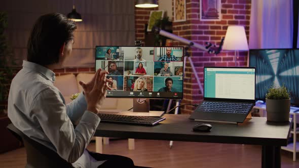 Office Worker Using Online Videoconference Call on Computer