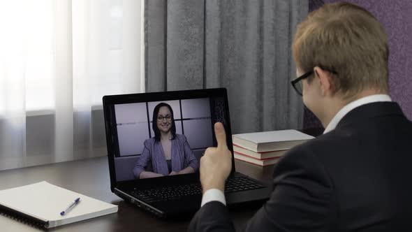 Businessman Make Video Chat Call with Woman on Laptop. Distance Conference