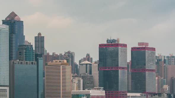 Hong Kong Skyline in the Morning Over Victoria Harbour Timelapse