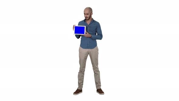 Smiling Casual Man Presenting a Tablet with a Blank Screen on White Background.