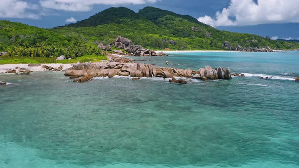 Aerial Drone Footage of Exotic Tropical Coastline at La Digue Island Seychelles