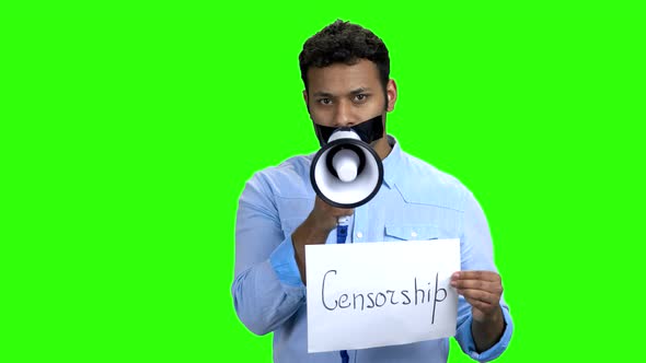 Censored Man with Taped Mouth Trying To Speak