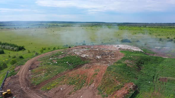 Aerial Top View of A Huge Waste Garbage Dump Rubbish Landfill