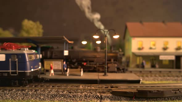 Toy Diesel Train on Model Railway Station.