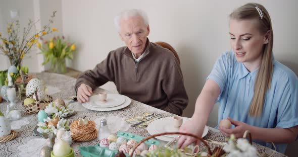 Happy Easter - Grandfather and Granddaughter Spending Easter Together at Home.