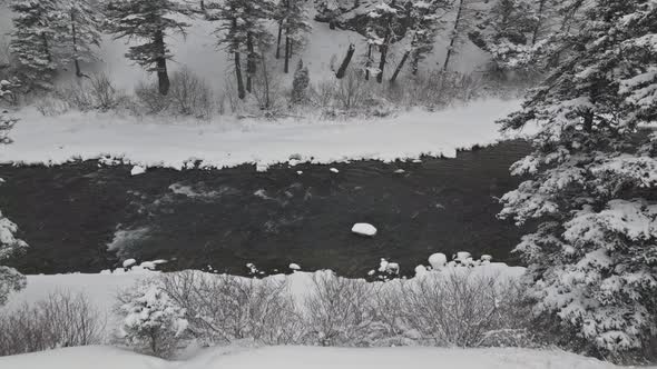 Aerial View Snowy Winter Scene with Snowfall at Yellowstone River Winter Yellowstone National Park