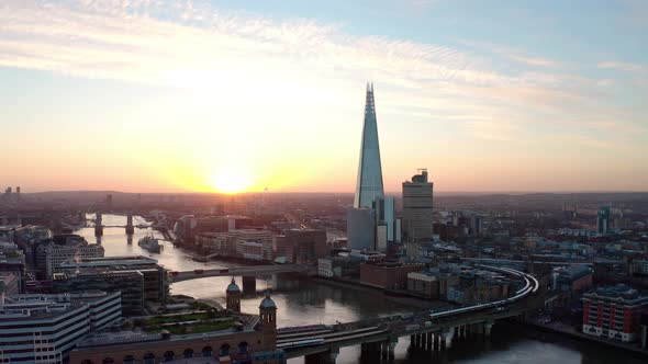 Aerial Slider drone shot of The Shard and Thames river London at sunrise