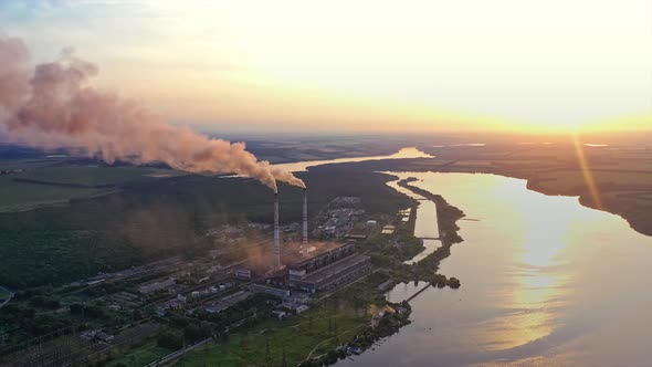 Scenic rural landscape. Aerial view of rural landscape against sunset