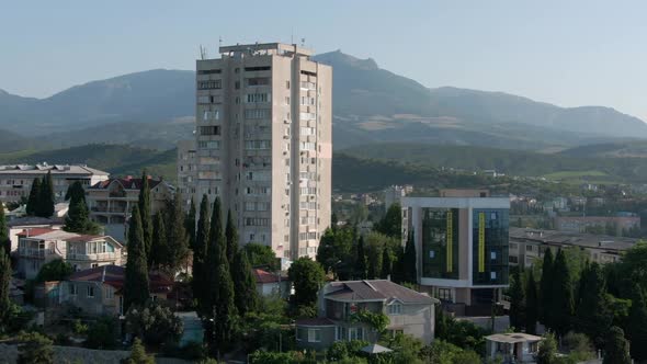 Small Guest Houses and Modern Multistorey Buildings of Alushta in the Neighborhood with Numerous