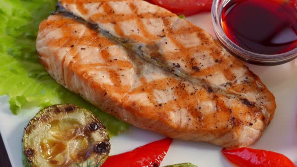 Grilled Salmon Fish Steak Served with Vegetables Seafood Concept