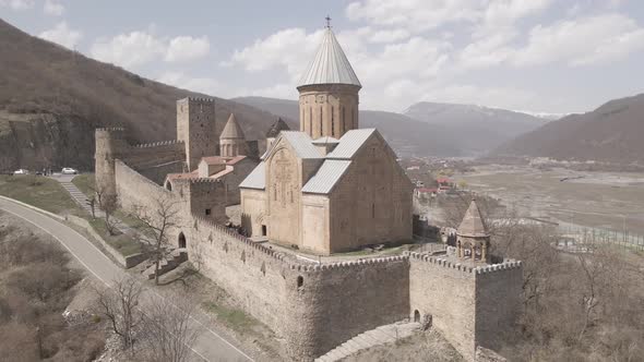 Aerial view of old Ananuri Fortress with two churches and picturesque view on river. Georgia 2021