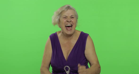 An Elderly Woman Laughing. Old Grandmother Smiles. Chroma Key