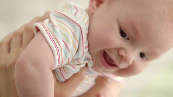 Happy Baby Face. Beautiful Infant Portrait. Close Up of Little Child