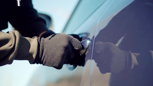 Thief Breaks Lock On Vehicle.Car Jacking Thief Steal Car Breaking Door.Car Vandalism Crime Theft