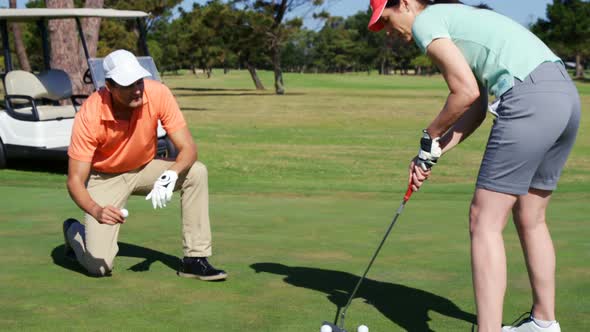 Golfers playing golf