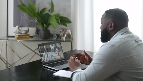 Group Brainstorm Online Video Meeting Virtual Conference with Multiracial Colleagues