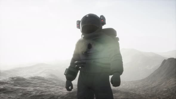 Astronaut on Another Planet with Dust and Fog