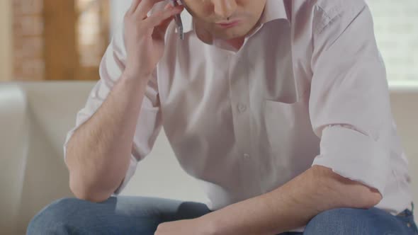 Man Having Conversation Over Mobile Phone and Finishing Call Solving Problems