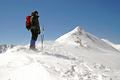 Winter Climber Facing Wind and Snow on Mountain Summit - PhotoDune Item for Sale