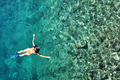 Woman Snorkeling in Turquoise Sea Water - PhotoDune Item for Sale