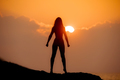 Silhouette of a Mentally and Physically Strong Woman on a Top at Sunrise - PhotoDune Item for Sale