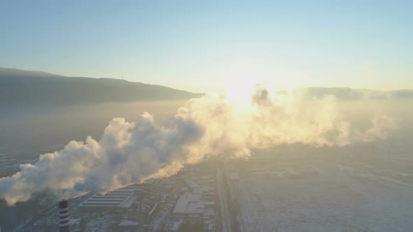 High View Across Industrial Town with Smoking Chimney Pipes, Climate Change and Global Warming