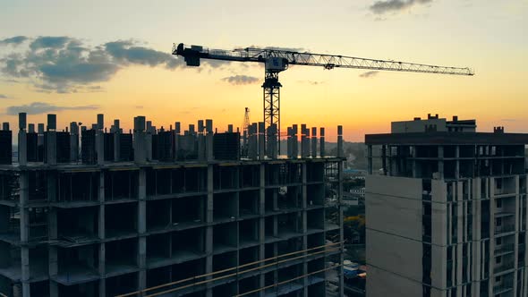 Sunset City with Multistory Houses Getting Constructed