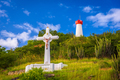 Crucifix and tower on St. Barthelemy Island. - PhotoDune Item for Sale