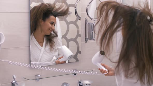 Happy Woman Singing in Bathroom