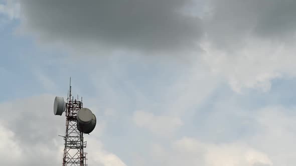 Timelapes footage Cell towers with sky and clouds.