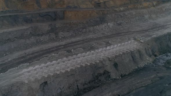 Aerial view of coal quarry with site loaded with explosives 04